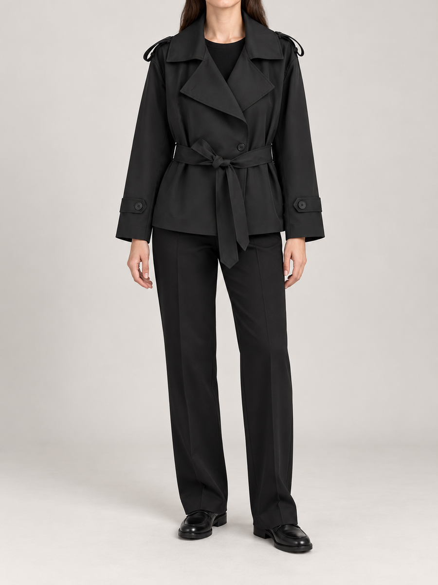 black short belted wrap trench, front view on a model