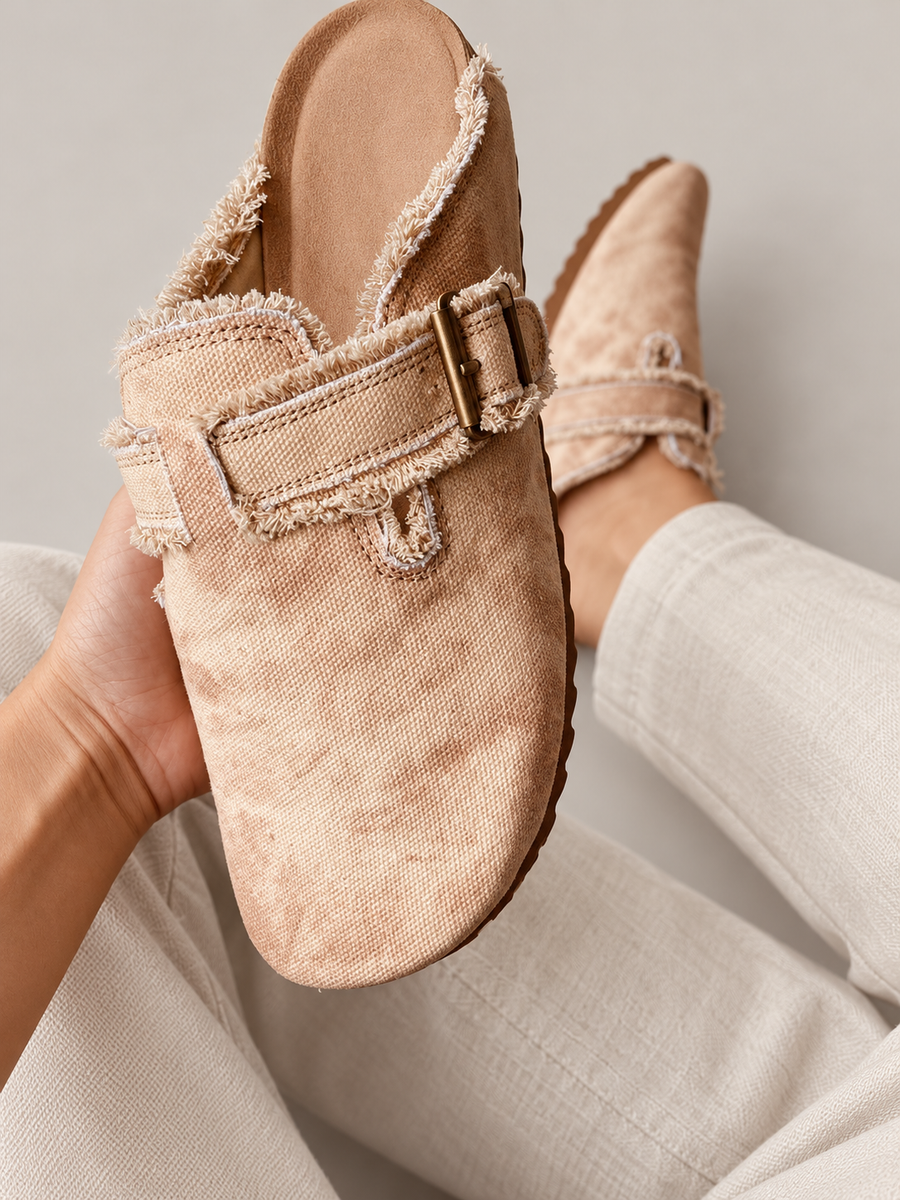tan frayed-edge fabric vintage clogs with rectangular buckle strap, front view