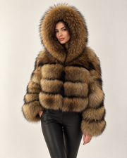 The Hooded Asiatic Raccoon Fur Coat in Natural, hooded — three quarter view