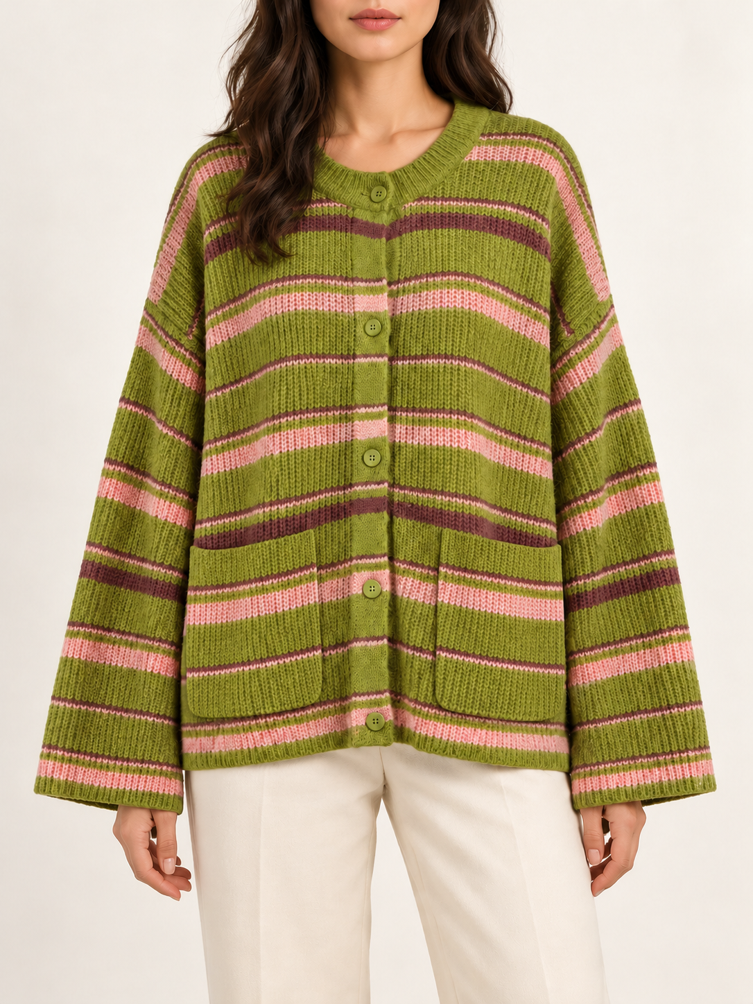 Green striped boyfriend cardigan with front pockets, worn by a model