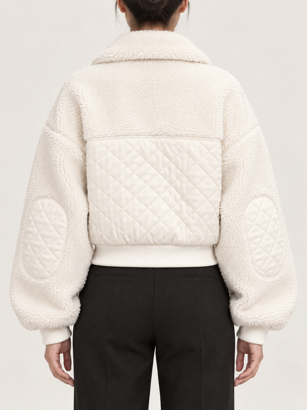 White cropped sherpa jacket, back view on a model