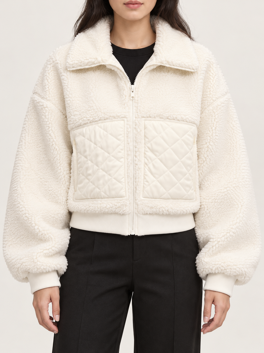 White cropped sherpa jacket, front view on a model