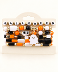 The six-piece ghost bead bracelet set on an ivory display holder.
