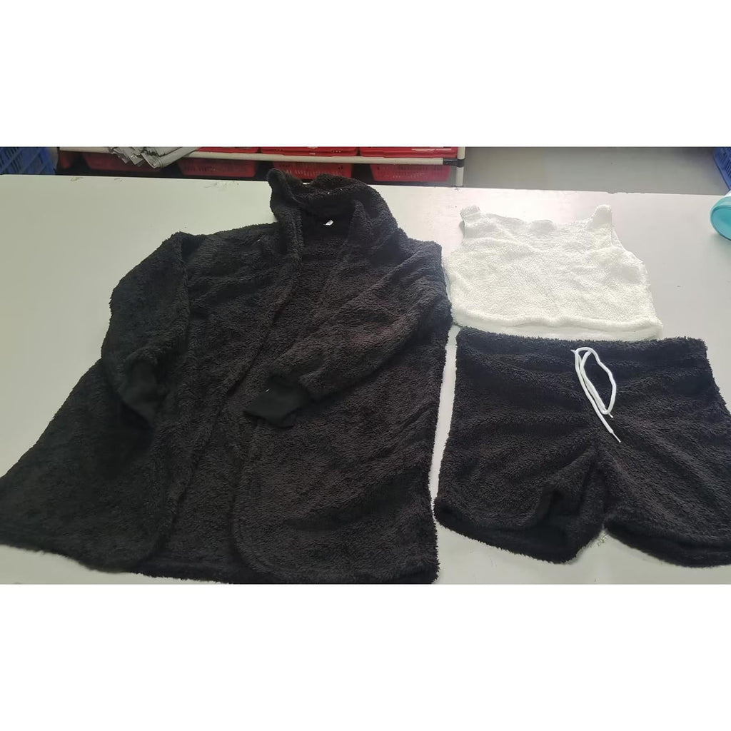 Supplier photograph of the included black cardigan, white cropped tank and black shorts with white drawstring