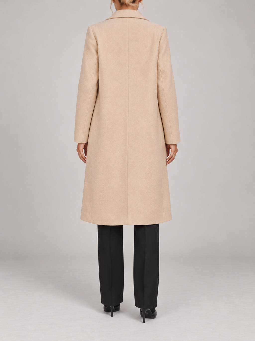 apricot knee-length single-breasted straight lapel coat with flap pockets, back view on a model