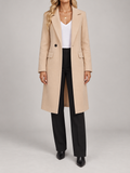 apricot knee-length single-breasted straight lapel coat with flap pockets, front view on a model