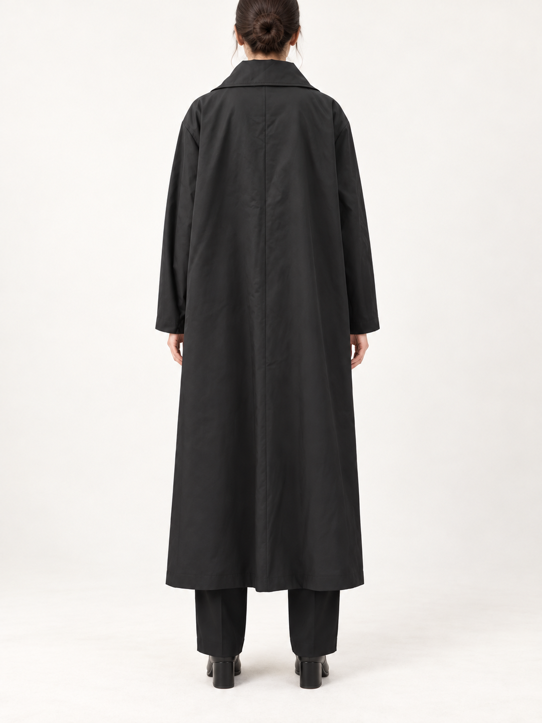 Black long high-collar trench coat, back view
