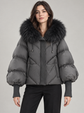 Grey puffer with black faux-fur hood trim, front view