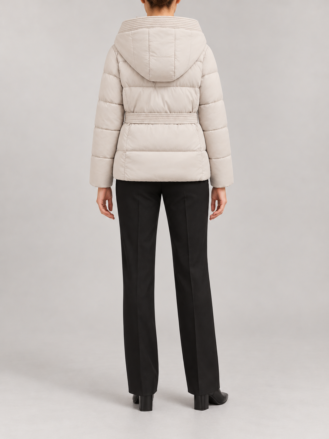 ivory hooded quilted short puffer jacket, upright inner collar, matching waist tie, horizontal padded panels, back view on a model