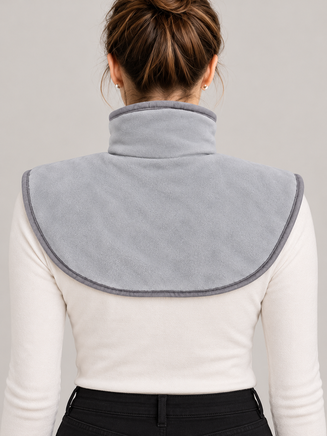 grey heated neck and shoulder wrap with front zip and black control, back view