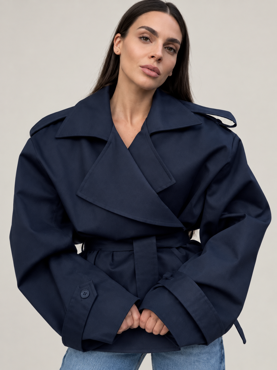Navy belted trench, front upper-body detail, front view