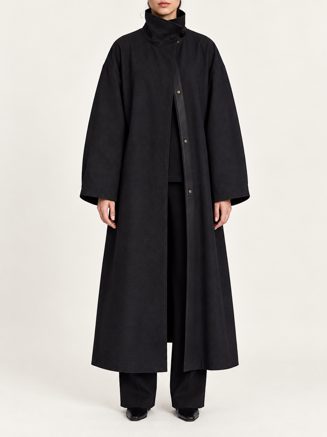 Black – Long loose coat, front view on model